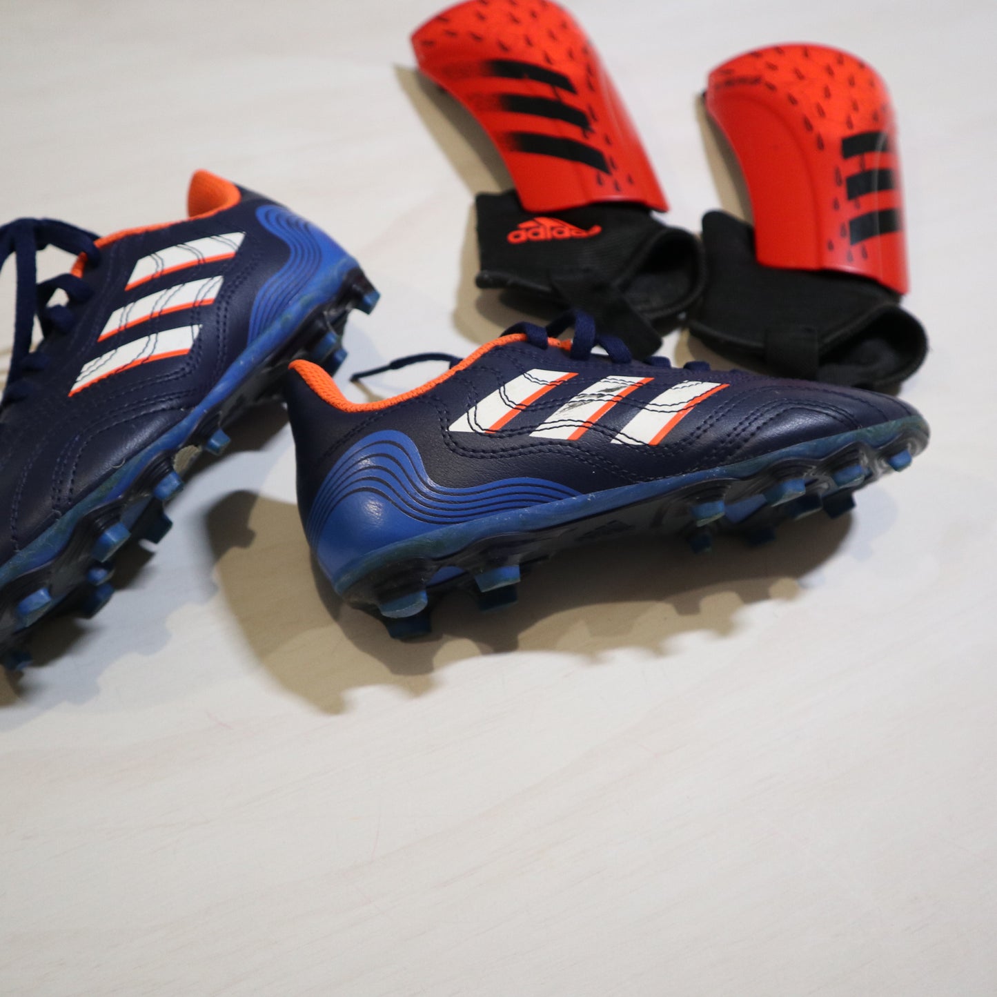 Adidas - Shin Guards + Cleats